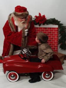 Naturally bearded Santa Howard with child - Have Santas Will Travel